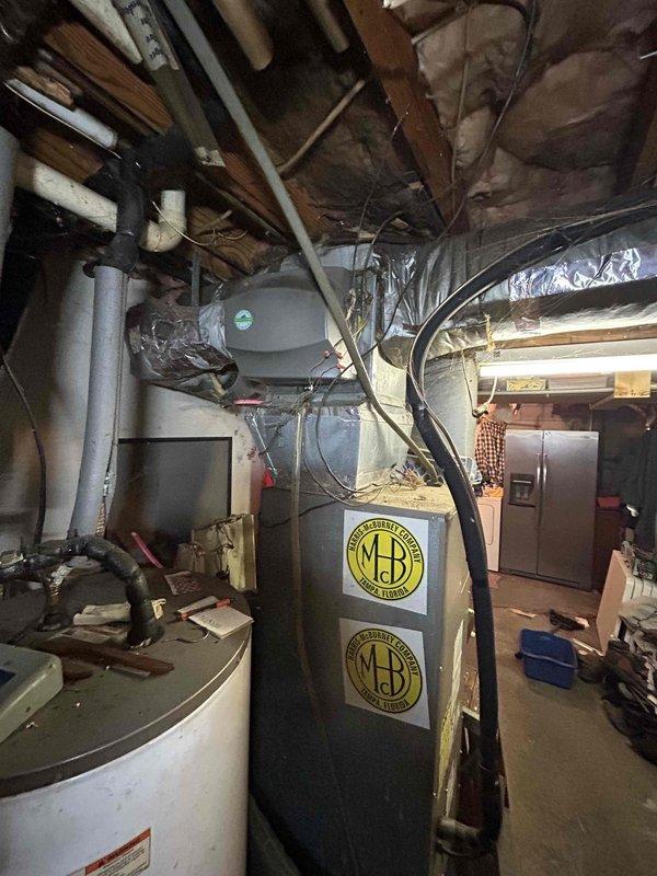 Completed an estimate for replacement of a 24-year-old AR36-1 heat pump system. Customer's current outdoor unit shows significant weathering and age-related deterioration. Indoor air handler located in garage has two MB-branded components. Customer requires a new 3-ton heat pump system, is interested in financing options, and plans to seek assistance through an agency program.