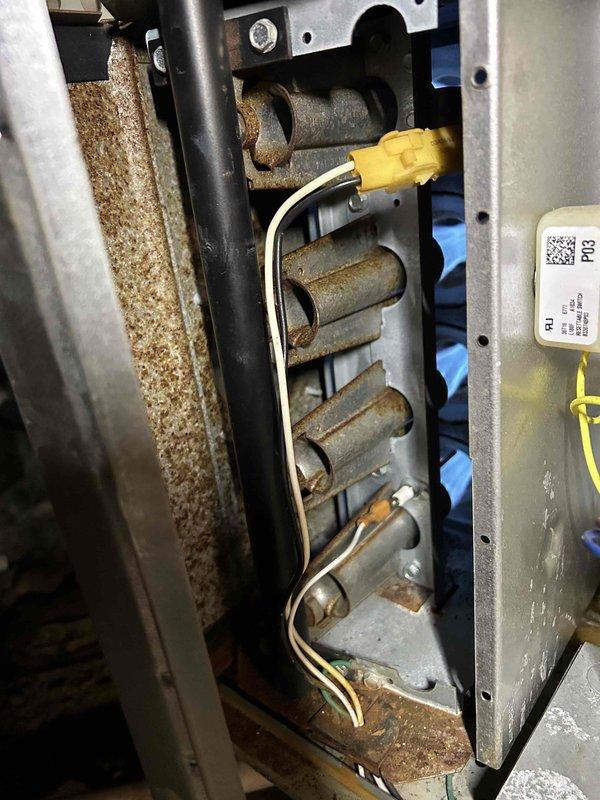 Responded to no-heat complaint on 10-year-old gas furnace system. Upon inspection, discovered significant corrosion on heat exchanger and burner assembly, with visible rust accumulation on critical components. System was short-cycling and continuing to run when thermostat was set to off, indicating control board malfunction. Crawlspace installation location showed evidence of moisture intrusion contributing to accelerated system deterioration.
