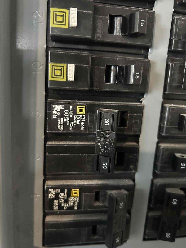 Performed comprehensive inspection of upstairs HVAC system in response to customer's high electricity bill concerns. Examined electrical panel, specifically checking the dedicated HVAC circuit breakers (two 30-amp breakers) for proper function and potential low voltage shorts as previously reported. All circuits were verified operational with no signs of electrical anomalies that could contribute to excessive power consumption.