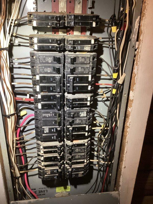 Performed detailed assessment of existing electrical panel for portable generator hookup installation. Inspected main breaker panel components and circuit capacity to determine appropriate connection points. Evaluated existing wiring configuration and identified suitable location for transfer switch or interlock kit. Examined outdoor area where generator will be positioned and assessed power cord routing requirements for safe operation during power outages.