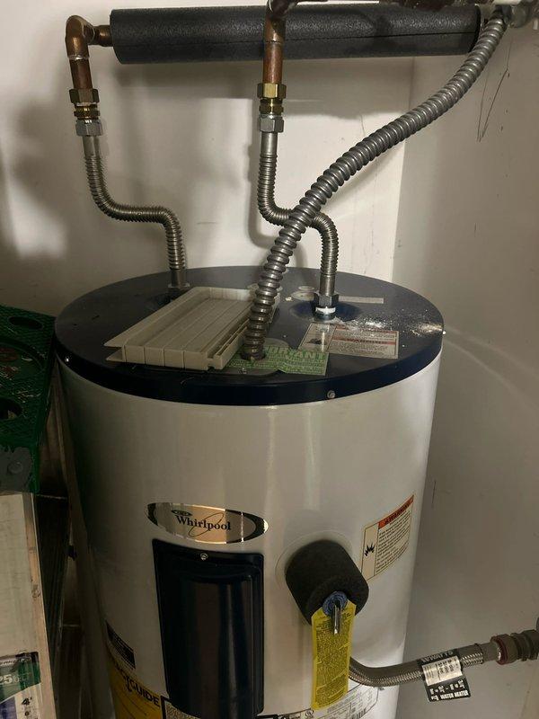 Completed routine plumbing inspection as part of customer's care plan. Identified constant drip issue in main bathroom bathtub faucet. Also inspected kitchen sink faucet functionality and water heater installation, noting proper water flow and confirming all connections to the Whirlpool water heater are secure with no visible leaks.