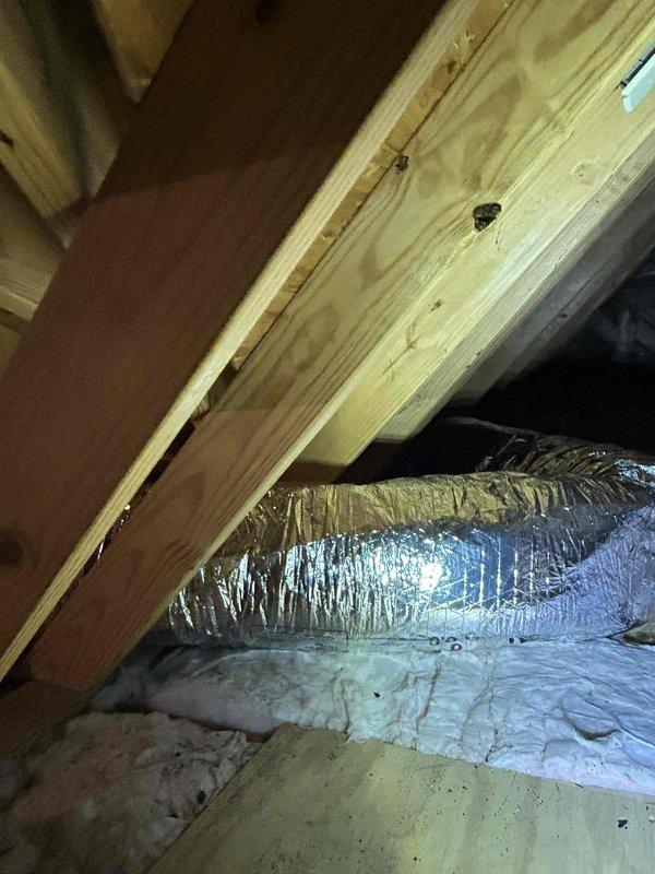 Completed installation of two 6x14 ceiling registers with supply boots, fabricating connections using three bags of R-8 insulated 8" flex duct. Installed tab-in 8" collars to properly connect new supply runs to existing ductwork, completing the warranty service as per previous site assessment.