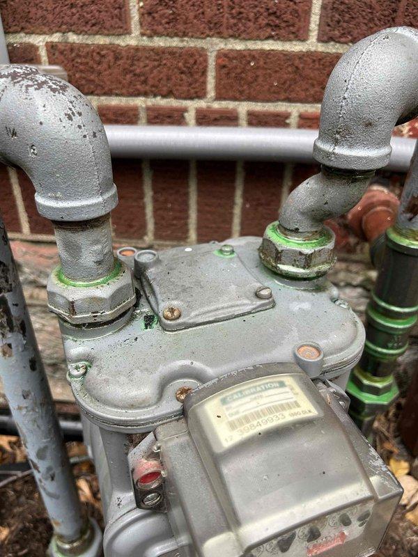 Successfully completed gas piping installation to generator, connecting from the main gas meter with proper pipe fittings and ensuring secure, leak-free connections. Installed appropriate regulator system against exterior brick wall with weather-resistant components and verified proper gas flow to support generator operation.