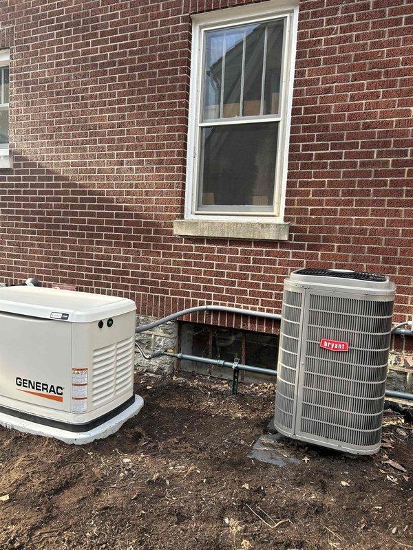Successfully installed Generac 22KW standby generator with 200 AMP automatic transfer switch alongside 50AMP load shed for larger AC unit. Removed unused gate circuit to create space for surge protector and modified garage feed to 120V to accommodate new equipment installation. Generator placement completed adjacent to existing Bryant HVAC system with proper utility connections.