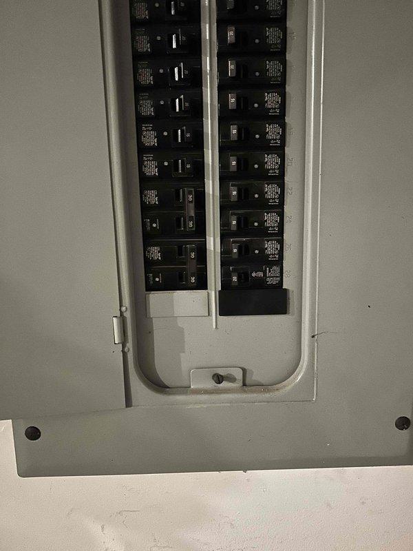 Completed electrical service work as requested by converting an existing 240V disconnect to a 120V 20AMP receptacle for tankless water heater. Installed new 4-square box with raised cover and receptacle, then configured appropriate breaker in the panel to support the new circuit configuration. Customer was provided information regarding their request for an additional receptacle installation in the hallway.