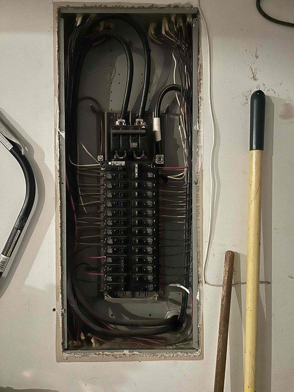 Completed electrical service work as requested by converting an existing 240V disconnect to a 120V 20AMP receptacle for tankless water heater. Installed new 4-square box with raised cover and receptacle, then configured appropriate breaker in the panel to support the new circuit configuration. Customer was provided information regarding their request for an additional receptacle installation in the hallway.