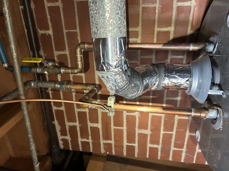 Performed comprehensive tune-up on dual HVAC system with humidifiers under expired contract. Conducted electrical testing on capacitor (measured at 6.04 microfarads) and inspected flue/ventilation connections. Replaced 16x25x1 filters as part of maintenance protocol and verified proper system operation. Customer renewed care plan during service visit.
