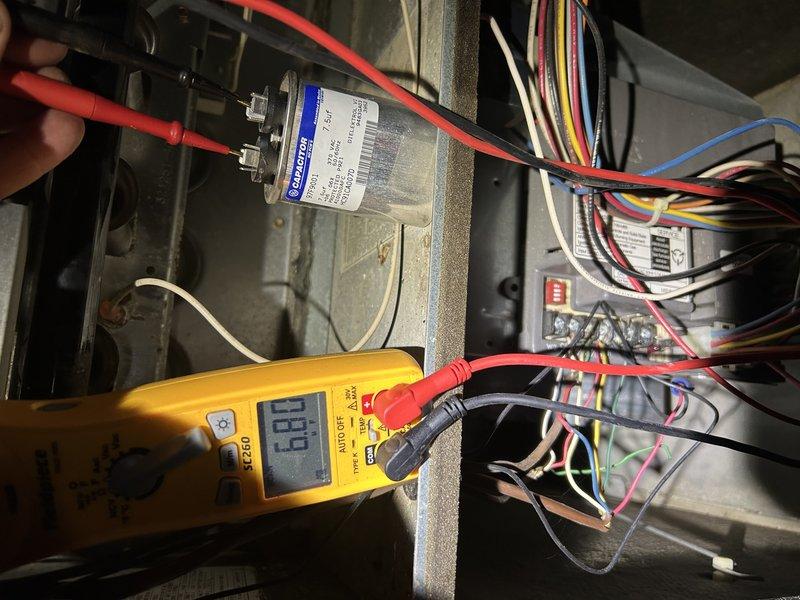 Performed comprehensive tune-up on dual HVAC system with humidifiers under expired contract. Conducted electrical testing on capacitor (measured at 6.04 microfarads) and inspected flue/ventilation connections. Replaced 16x25x1 filters as part of maintenance protocol and verified proper system operation. Customer renewed care plan during service visit.