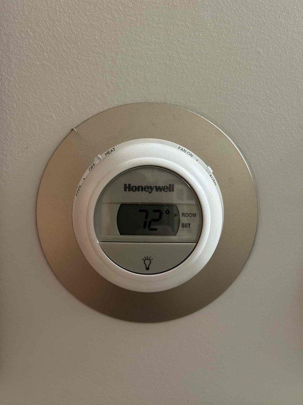 Completed scheduled Care Plan Tune Up on ground floor AC system. Performed comprehensive inspection of electrical components and wiring, ensuring all connections were secure and properly functioning. Verified thermostat operation with current room temperature reading at 72°F. System is operating within normal parameters.