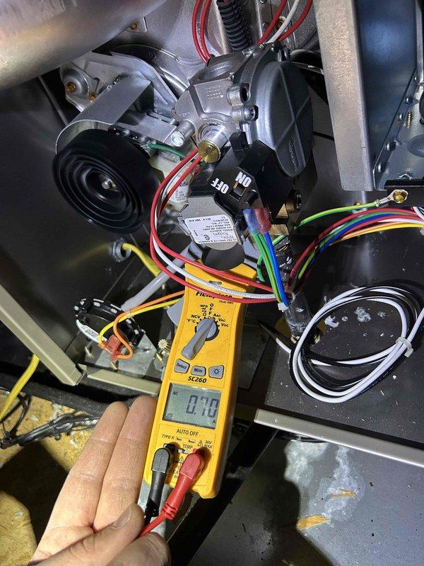 Performed scheduled Care Plan Tune Up on two AC units and two gas furnaces located in attic and basement. Conducted electrical testing with multimeter on components, obtaining satisfactory readings. Inspected exterior foundation access panel and evaluated surrounding drainage provisions. Customer-supplied filters were installed as part of maintenance protocol.