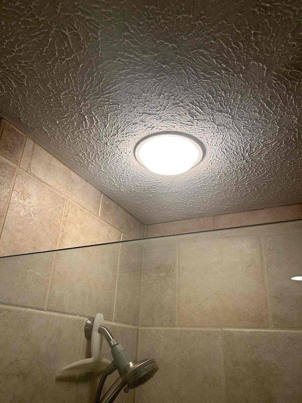 Responded to a service call for shower pressure issues in the master bathroom. Upon inspection, found the handheld shower unit was functioning with suboptimal pressure despite normal water flow to other fixtures in the home. Diagnosed and cleared mineral buildup in the shower head and pressure regulator, restoring proper water flow and pressure to the affected fixture.