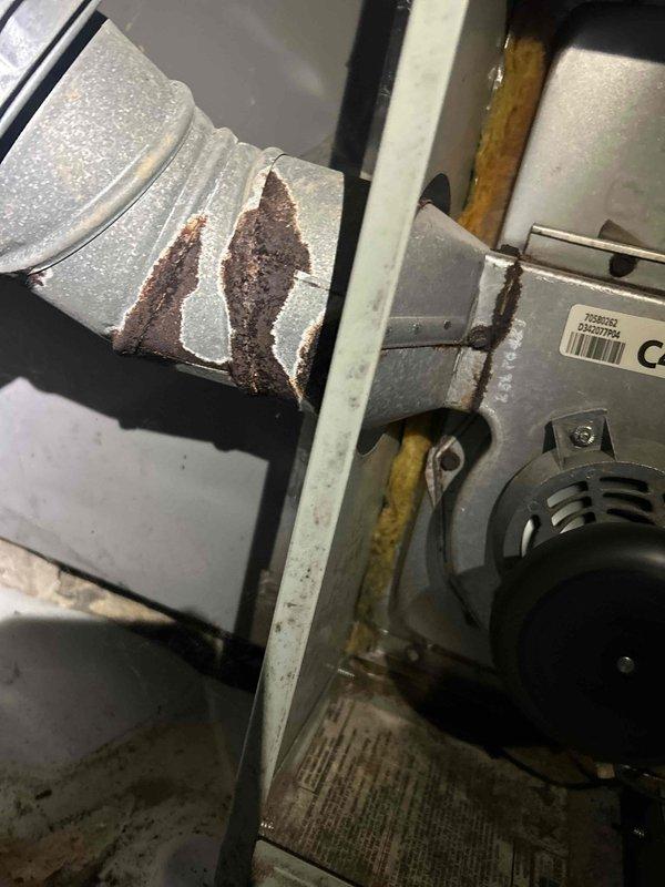 Completed Club Duo maintenance on dual AC and gas furnace systems as part of customer's care plan. Observed significant rust and corrosion on the furnace ductwork/plenum connection, documented with photos for future reference. Customer provided their own filters for the service.