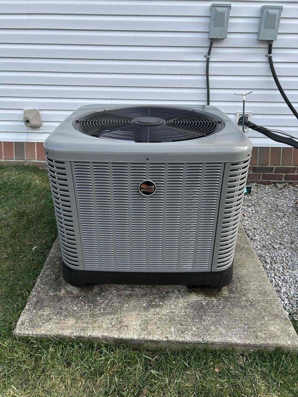 Successfully installed a complete Rheem/RUUD 2.5 ton 14.3 SEER2 heat pump system with RUUD air handler and 15KW heat kit. Utilized existing components including thermostat, concrete pad, disconnect box, auxiliary pan, and filter return grille while properly connecting refrigerant lines with insulation and installing safety features including SS2 coil drain sensor.