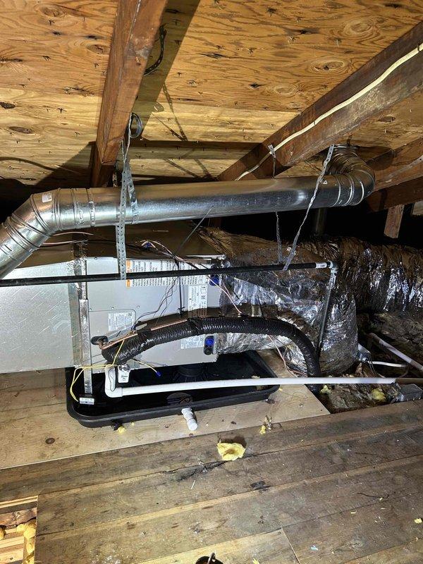 Successfully completed full system installation of a Bryant 2-stage 80% efficient furnace and 2.5 ton 14.3 SEER2 air conditioning system. Relocated furnace to attic space with proper platform support, installed new supply and return plenums with flex duct configuration, and mounted all components including evaporator coil, digital thermostat, and dual 14x20 return filter grilles according to manufacturer specifications.