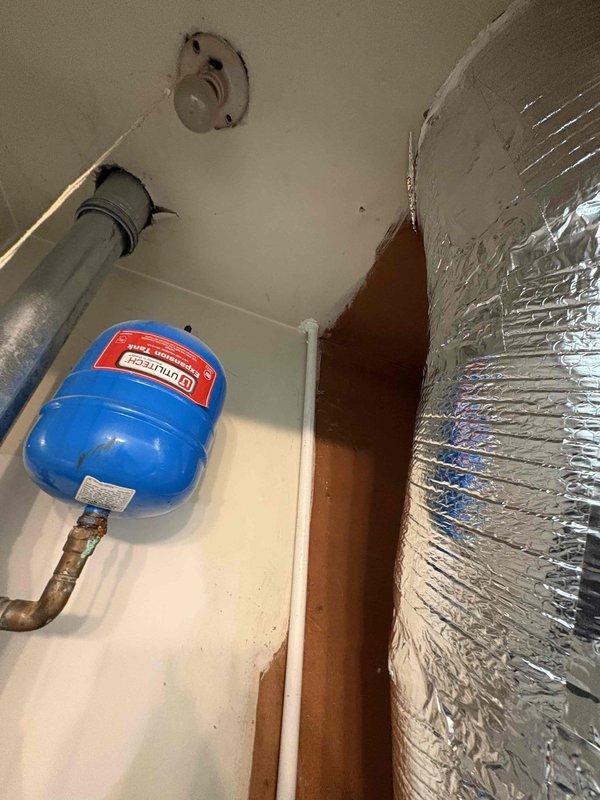 Successfully completed full system installation of a Bryant 2-stage 80% efficient furnace and 2.5 ton 14.3 SEER2 air conditioning system. Relocated furnace to attic space with proper platform support, installed new supply and return plenums with flex duct configuration, and mounted all components including evaporator coil, digital thermostat, and dual 14x20 return filter grilles according to manufacturer specifications.