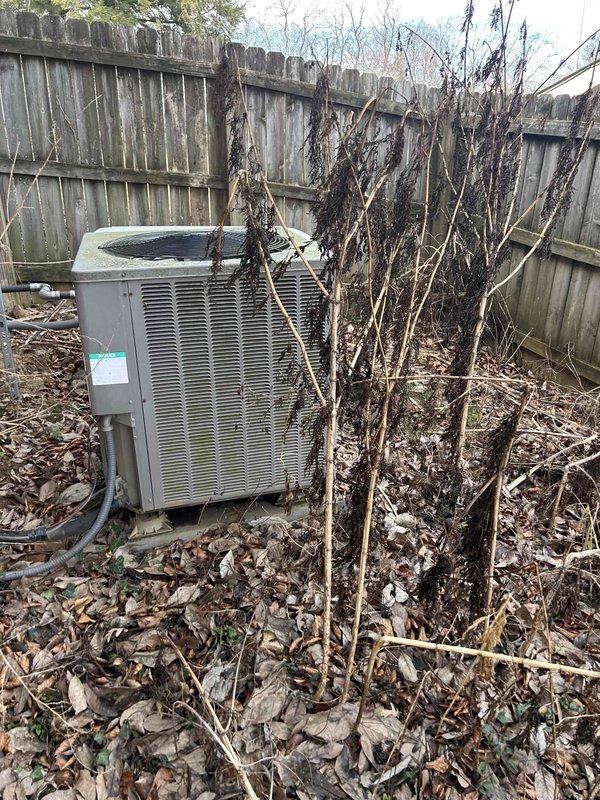 Performed diagnostic on 20-year-old gas furnace system experiencing temperature control issues (set point 70°F, actual 67°F) with reported inability to shut off. Inspection revealed significant airflow restrictions caused by excessive vegetation growth around outdoor condenser unit and disturbed/improperly distributed insulation in attic near indoor unit. Cleared vegetation debris, properly redistributed attic insulation, and serviced control board to restore normal thermostat communication. System now maintaining set temperature with proper cycling.