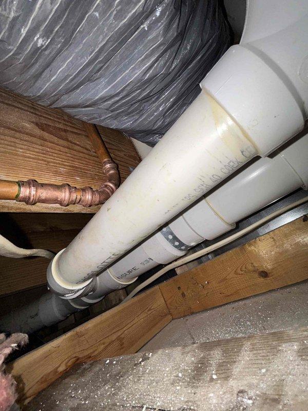 Located and repaired leak in first floor bathroom, originating from vent fixture. Investigation revealed copper pipe joints with signs of aging and steady dripping that had caused ceiling discoloration. Replaced damaged pipe sections and checked surrounding PVC connections to ensure complete resolution of the issue.