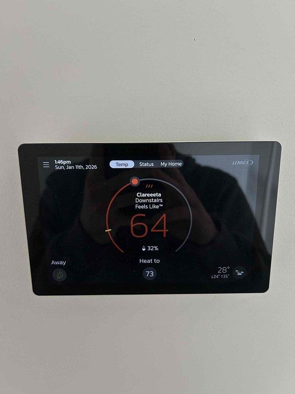 Responded to service call for no-heat condition on a 1-year-old Lennox gas HVAC system. Discovered system was operating in "Away" mode on the smart thermostat with a current temperature of 64°F despite being set to 73°F. Adjusted thermostat settings, verified proper operation with heat cycle activation, and confirmed system functionality with normal temperature rise.