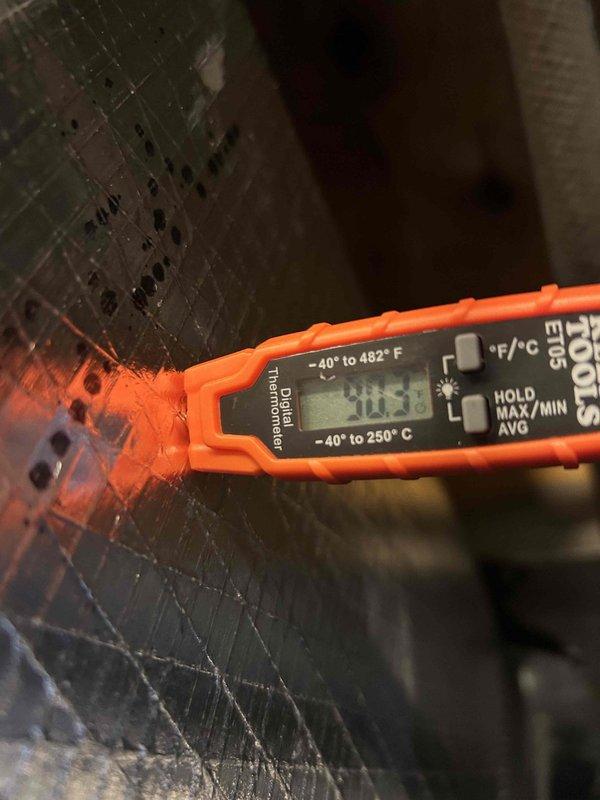 Performed routine heat pump/air handler tune-up in crawlspace. Checked system temperatures with digital thermometer, recording readings of 42.6°F and 51°F at different measurement points. Inspected and verified 20x20x1 filter condition. No service charges applied as visit was covered under maintenance club membership.