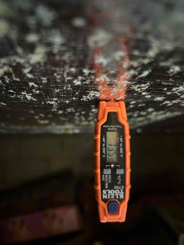 Performed routine heat pump/air handler tune-up in crawlspace. Checked system temperatures with digital thermometer, recording readings of 42.6°F and 51°F at different measurement points. Inspected and verified 20x20x1 filter condition. No service charges applied as visit was covered under maintenance club membership.