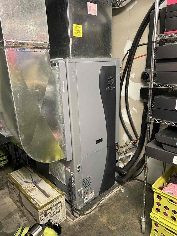Performed annual Care Plan tune-up on geothermal system located in basement. Customer supplied filters. Temperature readings (89.5°) were taken from system components and documented with photos. System appears to be functioning properly with appropriate connections to ductwork and insulated refrigerant lines.