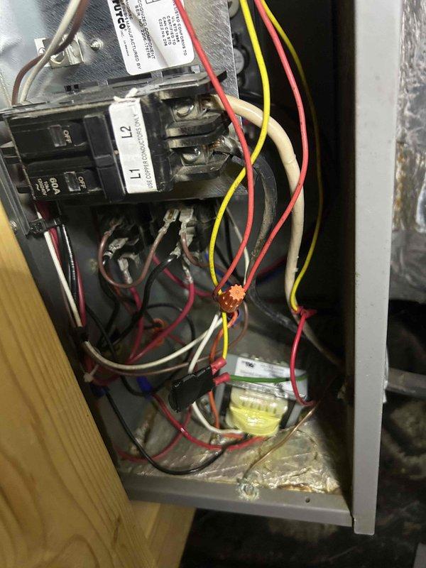 Responded to customer's no heat complaint for a 7-year-old electric HVAC system located in crawlspace. Inspection revealed contaminated evaporator coils requiring cleaning and electrical issues at the circuit panel that were affecting system operation. Performed thorough cleaning of cooling coils and repaired faulty wiring connections to restore proper heating function.