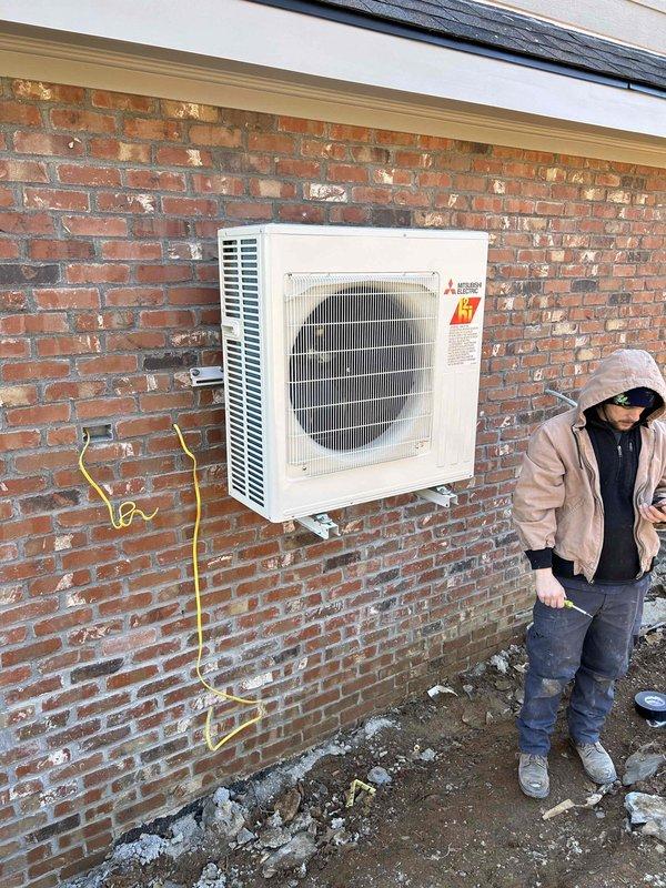 Completed reinstallation of ductwork for main basement system, securing all flexible ducts with proper strapping and sealing. Performed comprehensive system testing on the Mitsubishi mini-split heat pump, verifying proper operation after installation. Inspected all air filters throughout the property and provided operational status update on the entire project as requested.