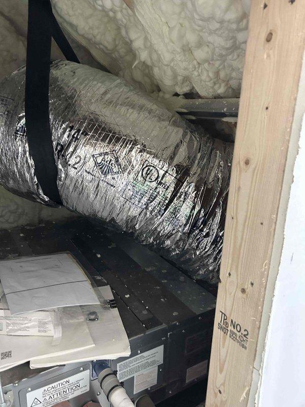 Completed reinstallation of ductwork for main basement system, securing all flexible ducts with proper strapping and sealing. Performed comprehensive system testing on the Mitsubishi mini-split heat pump, verifying proper operation after installation. Inspected all air filters throughout the property and provided operational status update on the entire project as requested.