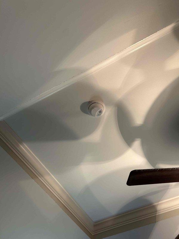 Successfully completed installation of 5 hardwired smoke detectors throughout the residence, replacing outdated units with modern sealed models featuring extended battery life. All units were properly mounted flush to ceiling surfaces and tested to ensure proper operation.