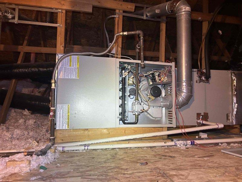 Performed diagnostic service on 19-year-old gas furnace in attic causing no heat issues on second floor while functioning normally downstairs. Inspection revealed severely corroded heat exchanger tubes with significant deterioration. Replaced damaged heat exchanger assembly and cleaned adjacent components to restore proper airflow distribution to upper level.