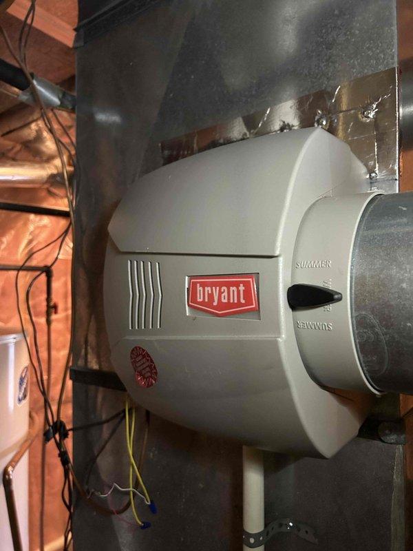 Performed Care Plan Tune Up on two Bryant HVAC systems (AC/gas furnace), one in attic and one in basement. Installed new 14x25x1 filters in humidifier #10 pad locations per maintenance plan. Customer provides their own Greenpac 20x25 filters. Conducted electrical testing with Fieldpiece SC440, confirming proper voltage readings (0.3) at the gas valve assembly. Inspected humidifier unit and verified all connections were secure and functioning properly.