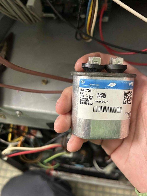 Diagnosed furnace issue after customer reported continued fault code despite previous flame sensor and igniter replacement. Tested and replaced faulty capacitor (measured at 5.91 MFD using Fieldpiece SC440 multimeter), restoring proper system operation.
