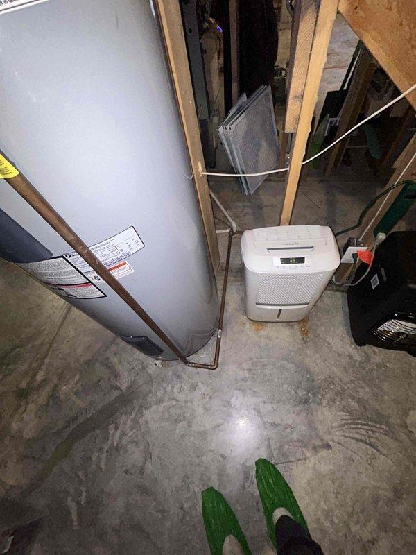 Performed routine plumbing inspection with focus on aging water heater as requested. Thoroughly examined water heater, noting proper operation but signs of age-related wear. Tested shower functionality and water pressure, which demonstrated normal operation. Inspected all visible plumbing connections and confirmed no active leaks present in the mechanical area where water heater is installed.