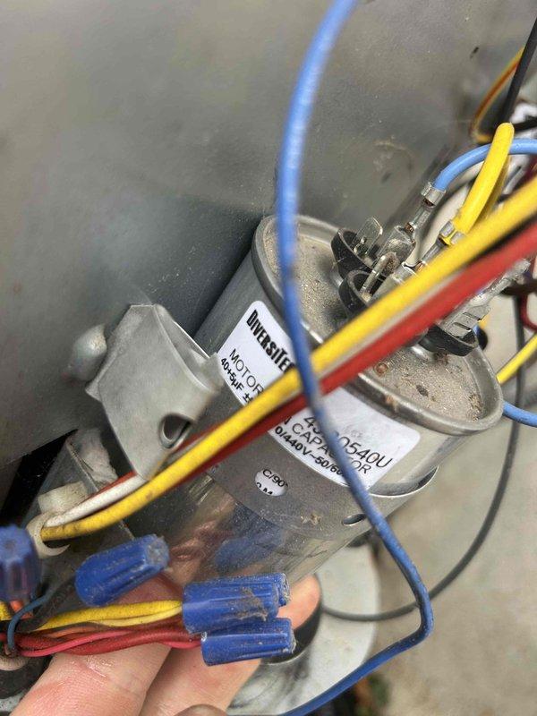 Performed routine care plan tune-up on heat pump/air handler system located in attic (garage access). Inspected electrical components including capacitor and verified proper connections. Conducted amperage measurements with clamp meter, confirming system is operating within specifications. Cleaned washable 16x25x1 filter as part of maintenance protocol.