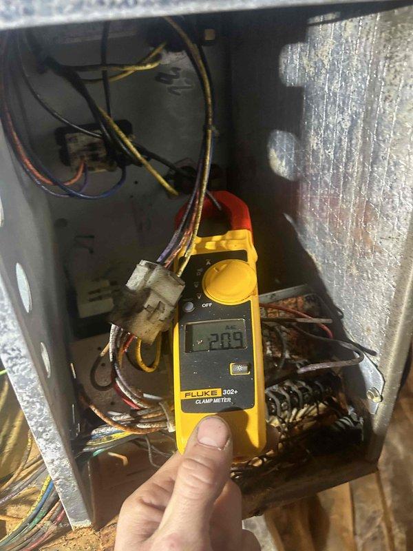 Completed scheduled Care Plan Tune Up on dual heat pump and air handler system. Arrived later than initially scheduled (customer was notified). Performed electrical testing on both units using Fluke clamp meter, recording amperage readings of 18.1A and 209V during operation to verify proper electrical performance.