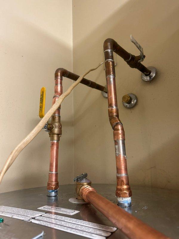 Completed installation of new 50-gallon electric short water heater, including removal and disposal of old unit. Installed new copper piping with sweat fittings, connected electrical components, and verified system for proper functionality and absence of leaks before completing the job.