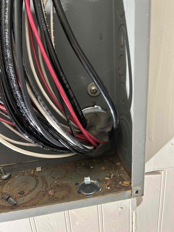 Completed installation of 200AMP outdoor main breaker panel with trough under meter base. Repurposed existing panel as junction box and extended all circuits to new panel with new breakers. Successfully installed whole home surge protector to provide comprehensive electrical protection.