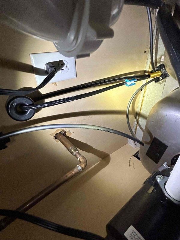 Installed customer-supplied kitchen faucet with proper connection to existing plumbing system. Verified functionality of supply lines and P-trap drain assembly, ensuring no leaks at connection points. All components properly secured and operational upon completion.