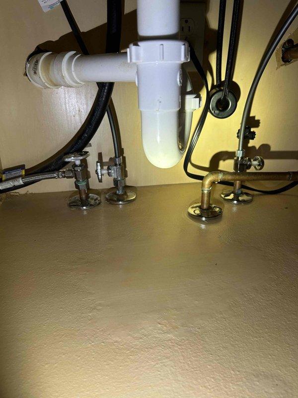 Installed customer-supplied kitchen faucet with proper connection to existing plumbing system. Verified functionality of supply lines and P-trap drain assembly, ensuring no leaks at connection points. All components properly secured and operational upon completion.