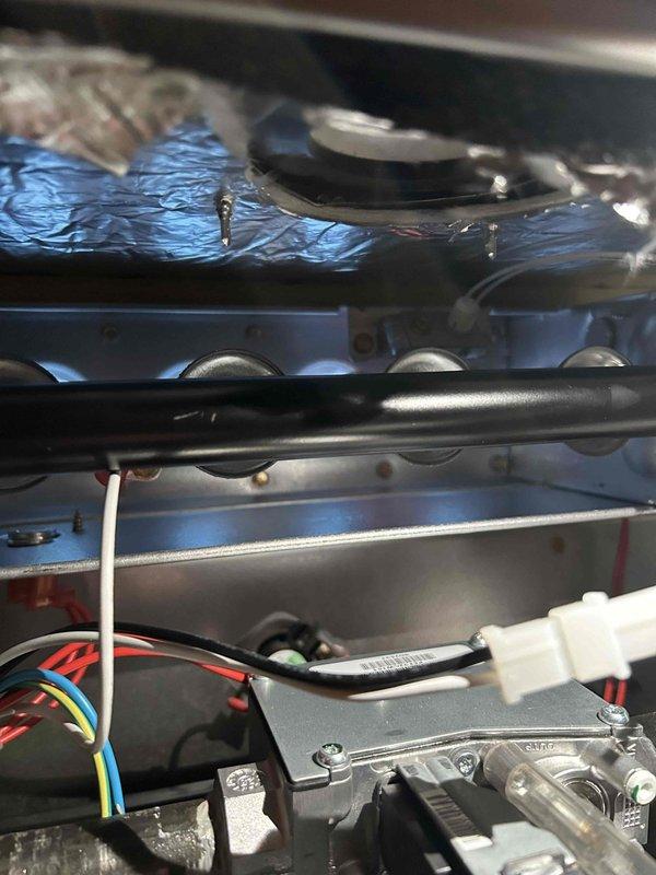 Performed annual Care Plan tune-up on basement HVAC system. Conducted amperage testing on equipment with readings at 3.14 amps, verifying proper electrical operation. Inspected interior components including wiring connections and motor assembly, confirming all elements functioning within specifications.