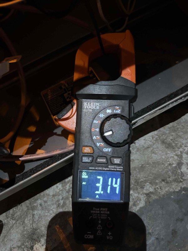 Performed annual Care Plan tune-up on basement HVAC system. Conducted amperage testing on equipment with readings at 3.14 amps, verifying proper electrical operation. Inspected interior components including wiring connections and motor assembly, confirming all elements functioning within specifications.