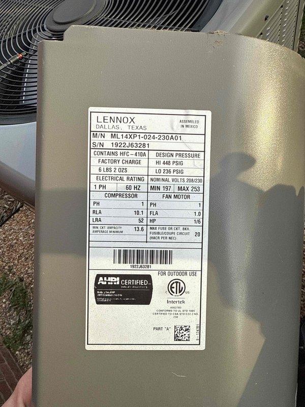 Completed warranty service for Tibbetts residence, replacing defective compressor on Lennox ML14XPT-024-230A01 outdoor unit (S/N 1922J63281) containing R-410A refrigerant. Noted damaged crawlspace access cover requiring attention.