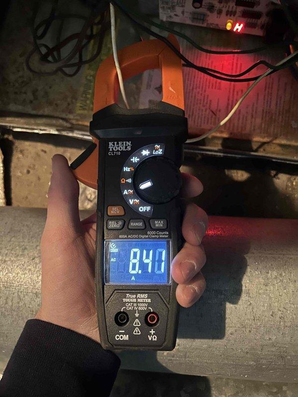 Performed annual Care Plan tune-up service on 4-year-old AC/GF system located in cellar. Conducted electrical diagnostics with clamp meter, recording readings of 8.40 amps and 6.59 amps at key test points. Customer-provided filter was installed during maintenance.