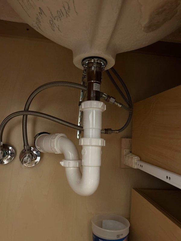 Responded to service call for leaking faucet handles in main bathroom and half bath. Inspected and repaired both fixtures, eliminating water leakage. Also addressed rusted sink stopper in basement guest bathroom that was seized in position.