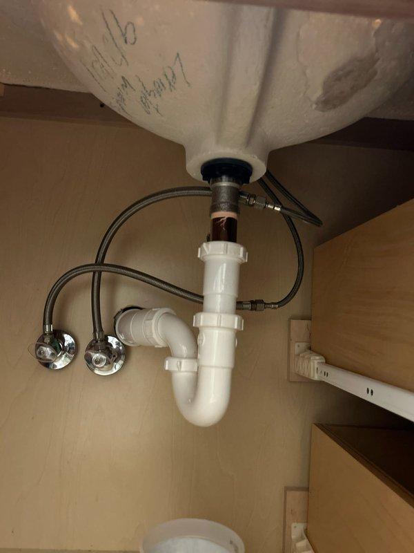 Responded to service call for leaking faucet handles in main bathroom and half bath. Inspected and repaired both fixtures, eliminating water leakage. Also addressed rusted sink stopper in basement guest bathroom that was seized in position.