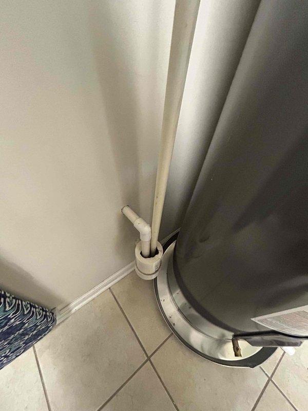 Conducted code compliance verification of two recently installed Rheem Professional water heaters in units #2011 and #304. Inspected all plumbing connections, PVC piping, electrical junction boxes, and verified proper hot/cold water line configuration. Both units were confirmed to meet all required code specifications for inspection approval.