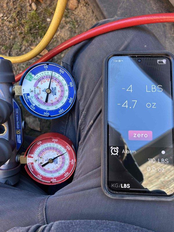 Performed diagnostic assessment on HVAC system in response to customer's concern about excessive runtime and increased energy consumption. Conducted refrigerant pressure testing using both analog gauges and digital measurement tools, revealing system was undercharged by approximately 4 pounds. Inspected thermostat operation (Honeywell ProSeries) which was functioning correctly in heating mode with appropriate temperature settings.