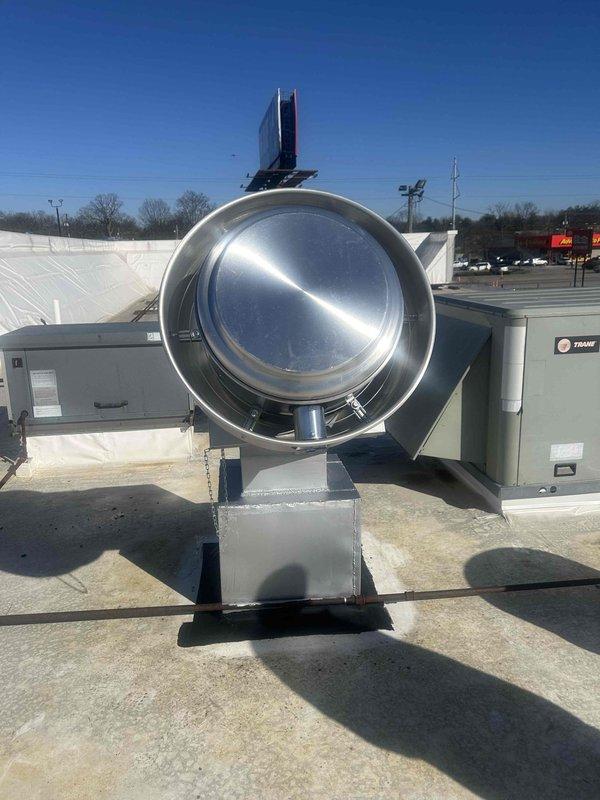 Responded to commercial restaurant hood power issue. Upon inspection of rooftop HVAC system with exhaust components, accessed and examined electrical breaker panel where several circuits were identified with colored labels. Located tripped breaker, reset system, and verified proper operation of hood ventilation equipment.
