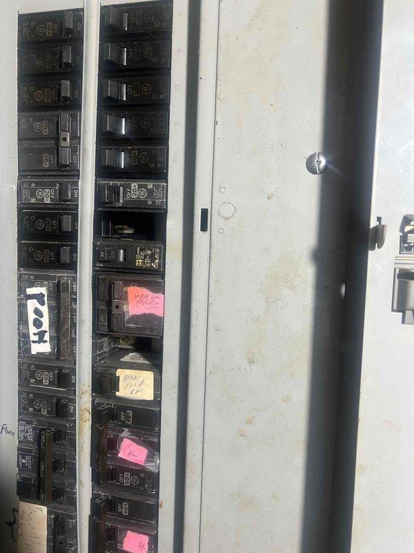 Responded to commercial restaurant hood power issue. Upon inspection of rooftop HVAC system with exhaust components, accessed and examined electrical breaker panel where several circuits were identified with colored labels. Located tripped breaker, reset system, and verified proper operation of hood ventilation equipment.