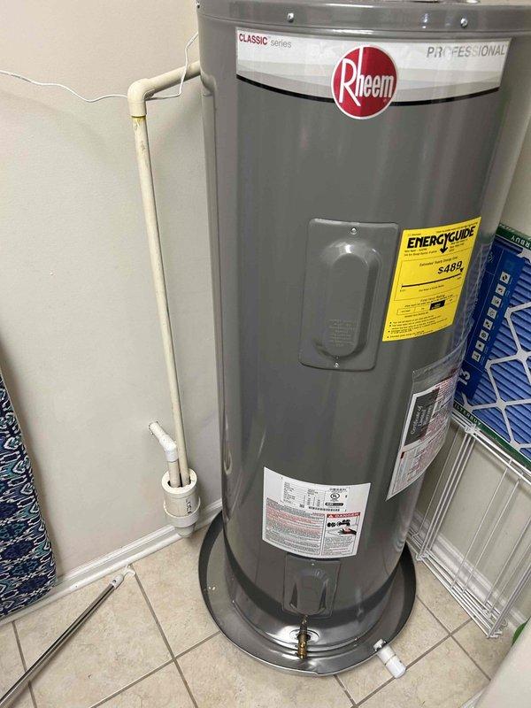 Completed installation of a Rheem Classic 50-gallon electric water heater with auto shut-off valve system in Unit #304. Installed drain pan, connected to existing water lines and electrical service, and properly disposed of the old unit. All work completed according to KY Division of Plumbing standards with appropriate permits and inspections.
